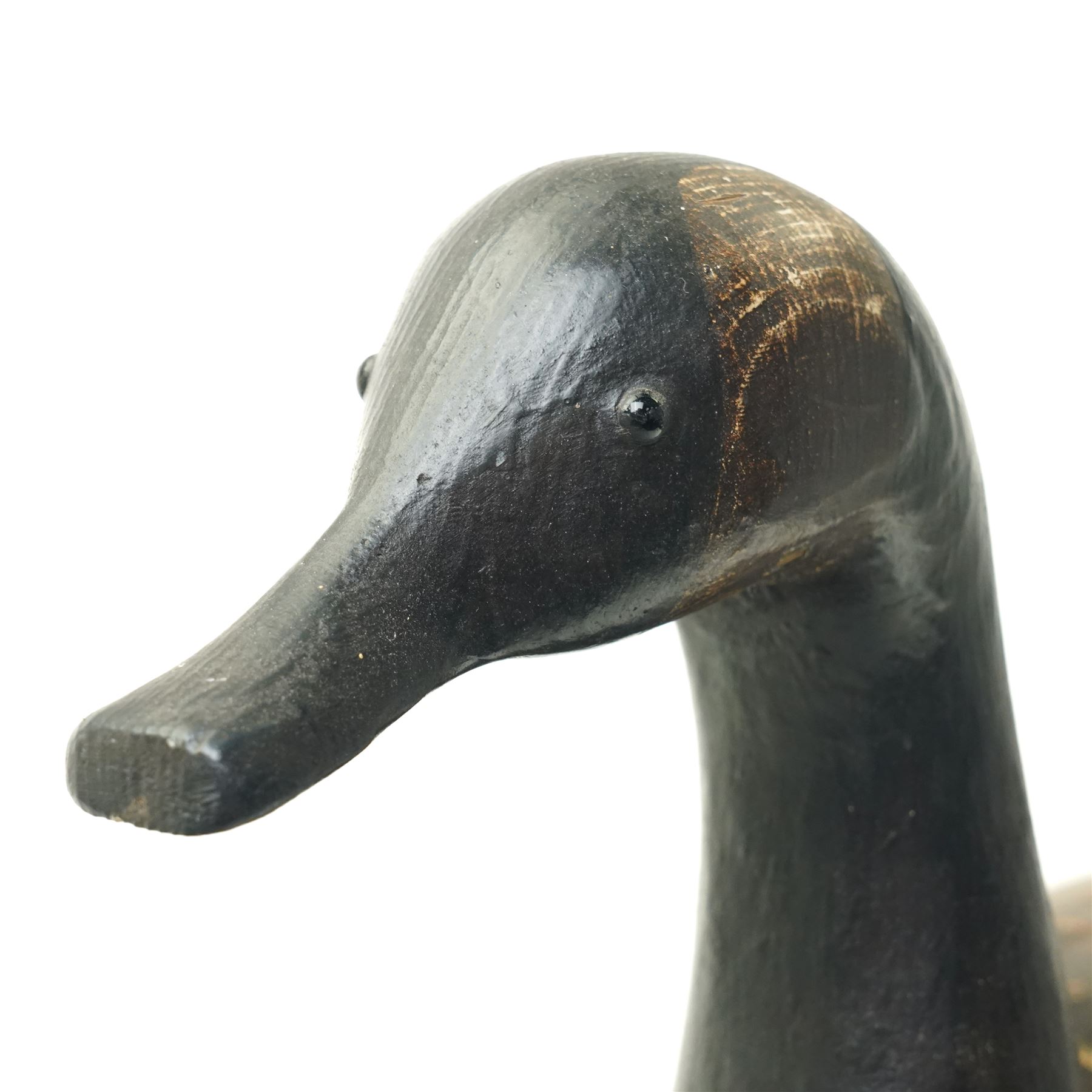 Guy Taplin (British 1939-): 'Canada Goose', carved and polychrome painted wooden sculpture of a bird, on a naturalistic driftwood base, H64cm
Provenance: purchased directly from the artist in the 1990s