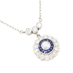 Platinum sapphire and diamond necklace, milgrain set round brilliant cut diamond and calibre cut sapphire cluster, suspending from three round brilliant cut diamonds, to a trace link chain necklace, total diamond weight 0.65 carat, total sapphire weight approx 0.30 carat