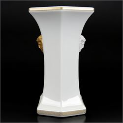 Rosenthal Versace Gorgona vase, of rectagular form with fluted base and rim, decorated in relief with medusa masks and gilt greek key borders upon a white ground, boxed, H23cm