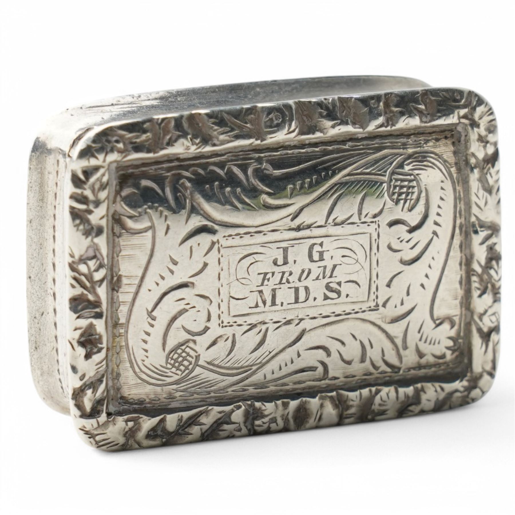 Victorian rectangular silver vinaigrette with inscription and floral engraving, hinged pierced grille  Birmingham circa 1840 Maker Nathaniel Mills