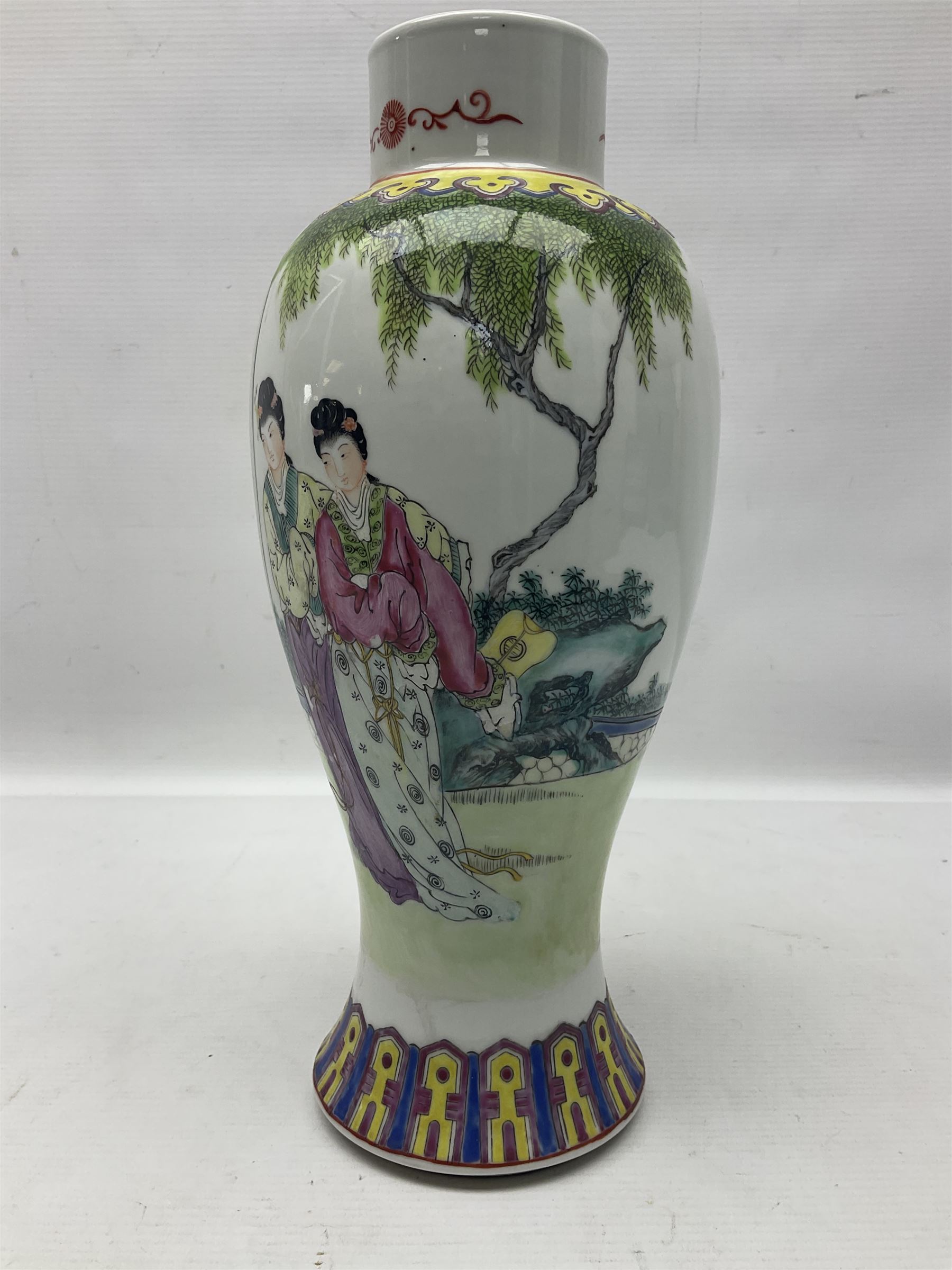 Chinese Famille Rose vase of slender baluster form, decorated with figures, H31cm  