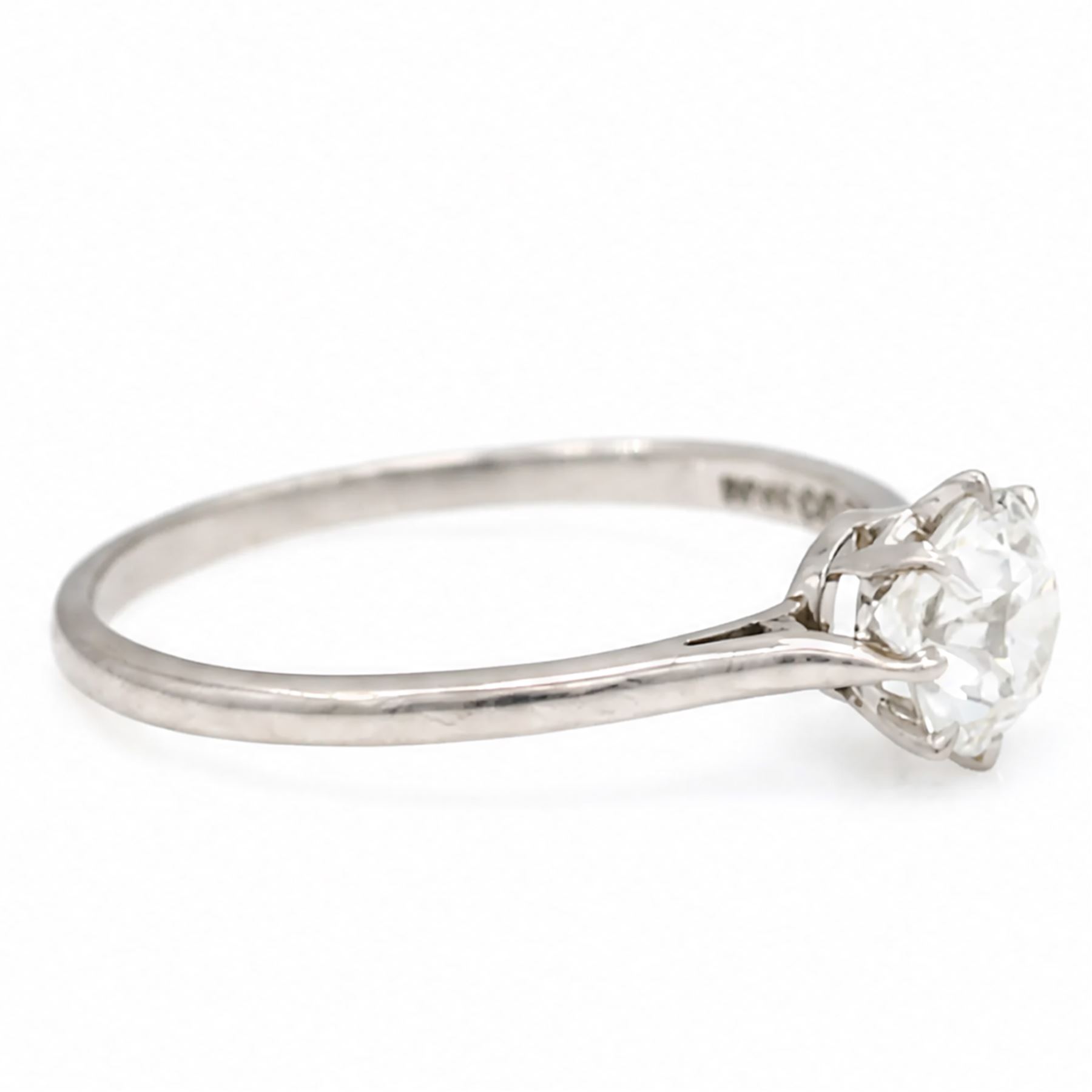 Early 20th century platinum diamond ring, single with a single old cut diamond of approx 0.85 carat, in tooled leather ring box