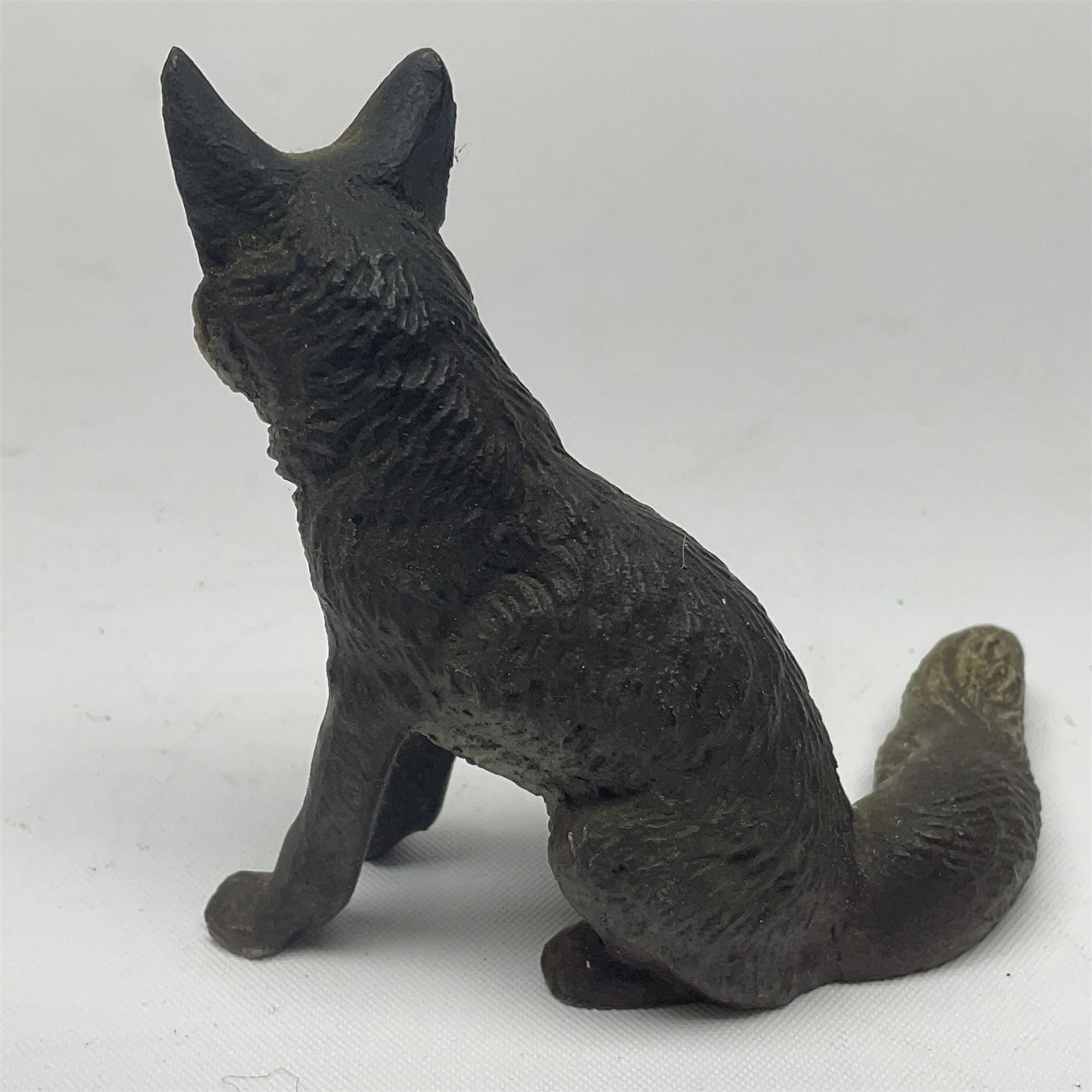 Cold painted bronze model of a seated fox, together with similar standing terrier, fox H5cm