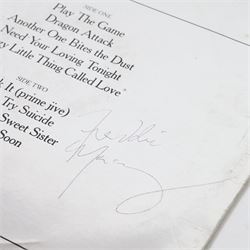 Queen 'The Game' signed vinyl record, signed to the reverse of the mirrored silver sleeve by Freddie Mercury, Roger Taylor and John Deacon, released by EMI records 1980

Provenance by vendor repute: Queen played at Elland Road in Leeds 29th May 1982; the vendor met the band the day before and had this record signed by the three members, but Brian May had not yet got off the train. The vendor called up the hotel and impersonated the band's then manager, Gerry Stickles, (by putting on an Australian accent!) to ask what time the band were arriving, then waited for them at the hotel.