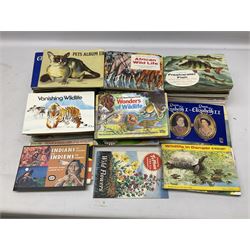 Over eighty trade card albums by Brooke Bond, Lyons, PG Tips, Hornimans, Ty-Phoo etc including some duplicates; and large quantity of loose trade cards