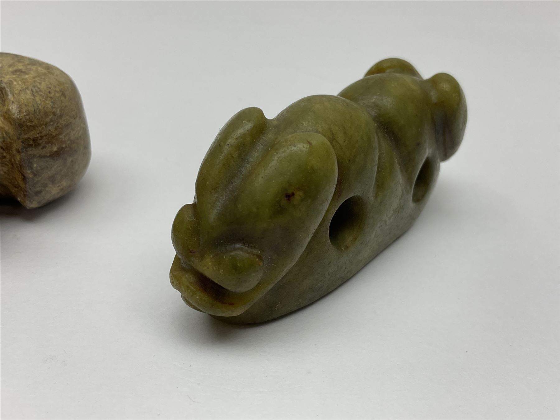 Chinese hardstone carving of a fish amongst coral, with platted rope handle, together with other hardstone and soft stone carvings  