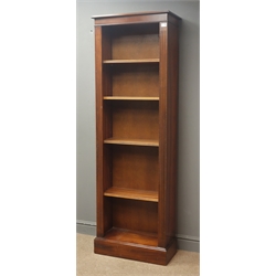  Reproduction mahogany narrow open bookcase, projecting cornice, reeded sides, four adjustable shelves, plinth base, W62cm, H185cm, D30cm  