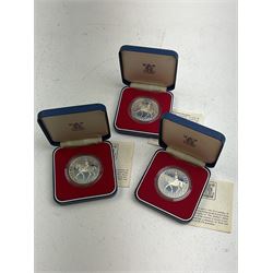 Ten The Royal Mint United Kingdom silver proof coins or sets, comprising three 1977 crowns, two 1989 one pounds, two 1990 five pence two-coin sets, 1990 piedfort five pence and two 1991 one pounds, all cased with certificates