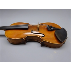  Late 19th century German violin c1890 with 36cm two-piece maple back and ribs and spruce top, bears manuscript label 'Joseph Guarnerius fecit Cremona anno 1739', L59.5cm overall, in later carrying case with two bows  