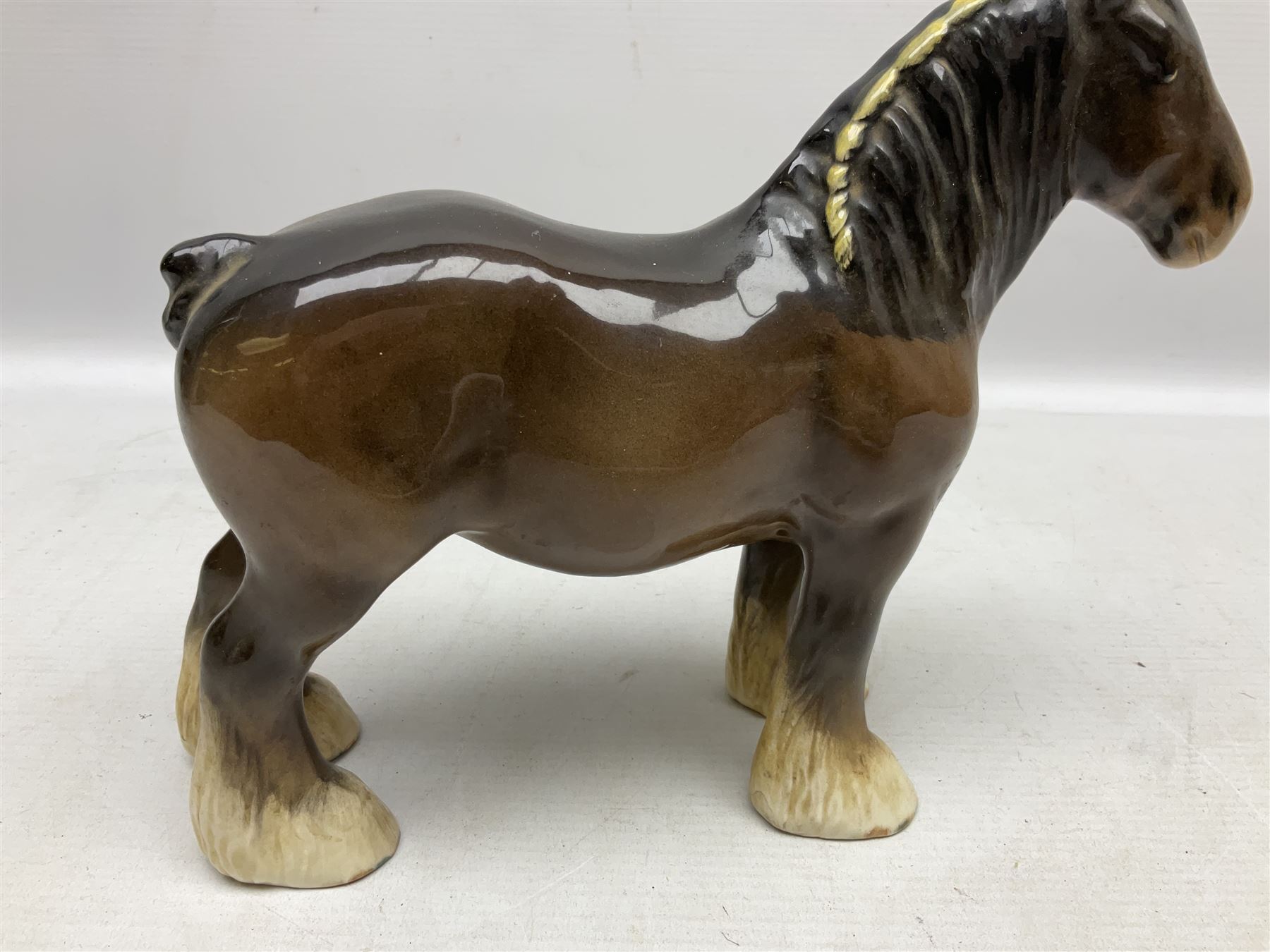 Group of three Beswick Shire horses, comprising CH. Burnham Beauty mare in matte finish, dapple grey horse and bay horse, all with stamped marks beneath