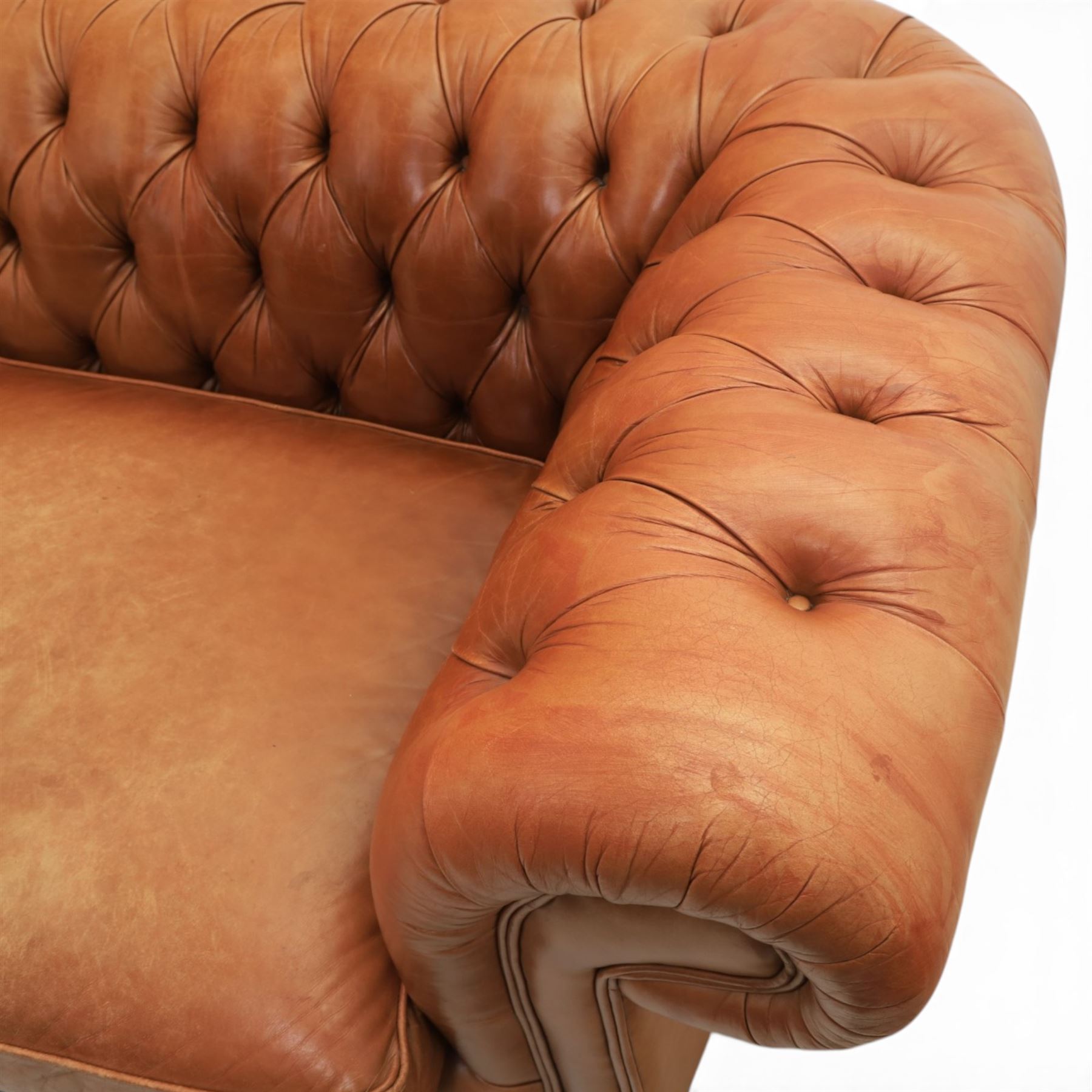 Springvale - Large three seat Chesterfield sofa, upholstered in buttoned tan leather, two cushion deep seat, turned bun feet
