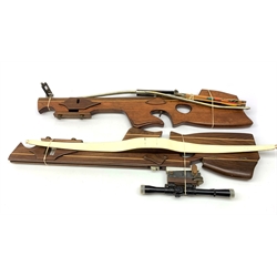 20th century crossbow with sectional mahogany shaped stock and Nikko Stirling telescopic sight L89cm; together with another similar with hinged foresight; and six arrows (8)