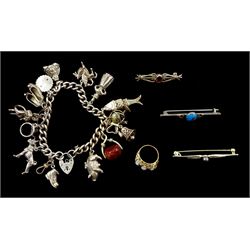 Silver charm bracelet including Welsh dragon, globe, British bull dog, pig, devil and fish, 9ct gold opal and cubic zirconia ring and three silver brooches