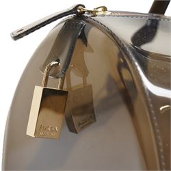 Furla - ‘Candy’ top-handle bag in smoky black transparent PVC, with rolled top handles, gold-tone hardware padlock, with front-hanging charm chain, with original Furla dust bag