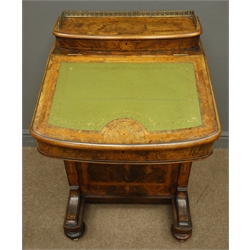  19th Century inlaid figured walnut Davenport, with brass galleried stationery compartment and leather inset slope top above four real & four faux drawers with turned wooden handles, bun turned feet with brass sockets and castors, H86cm, W56cm, D55cm  