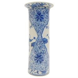 19th century Chinese sleeve vase decorated in blue and white with panels of mother and child within a floral and scroll surround, four character Kangxi mark H27cm