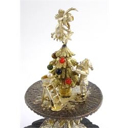 Christopher Nigel Lawrence limited edition silver and parcel gilt surprise mushroom, the textured domed cover opening to reveal two elves decorating a semi-precious gem set Christmas tree, upon a slate base, no 100/250, hallmarked Christopher Nigel Lawrence, London 1980, overall H9cm