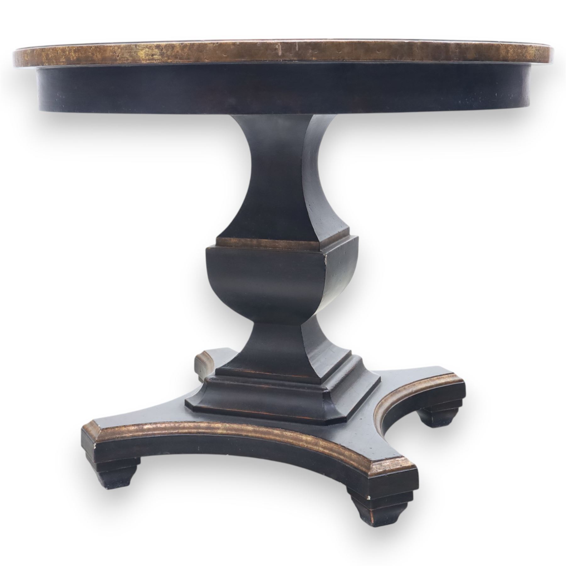 Contemporary circular painted dining table and four red upholstered chairs, table with distressed finish in black with quatriform base and bronze painted edges, chairs with 