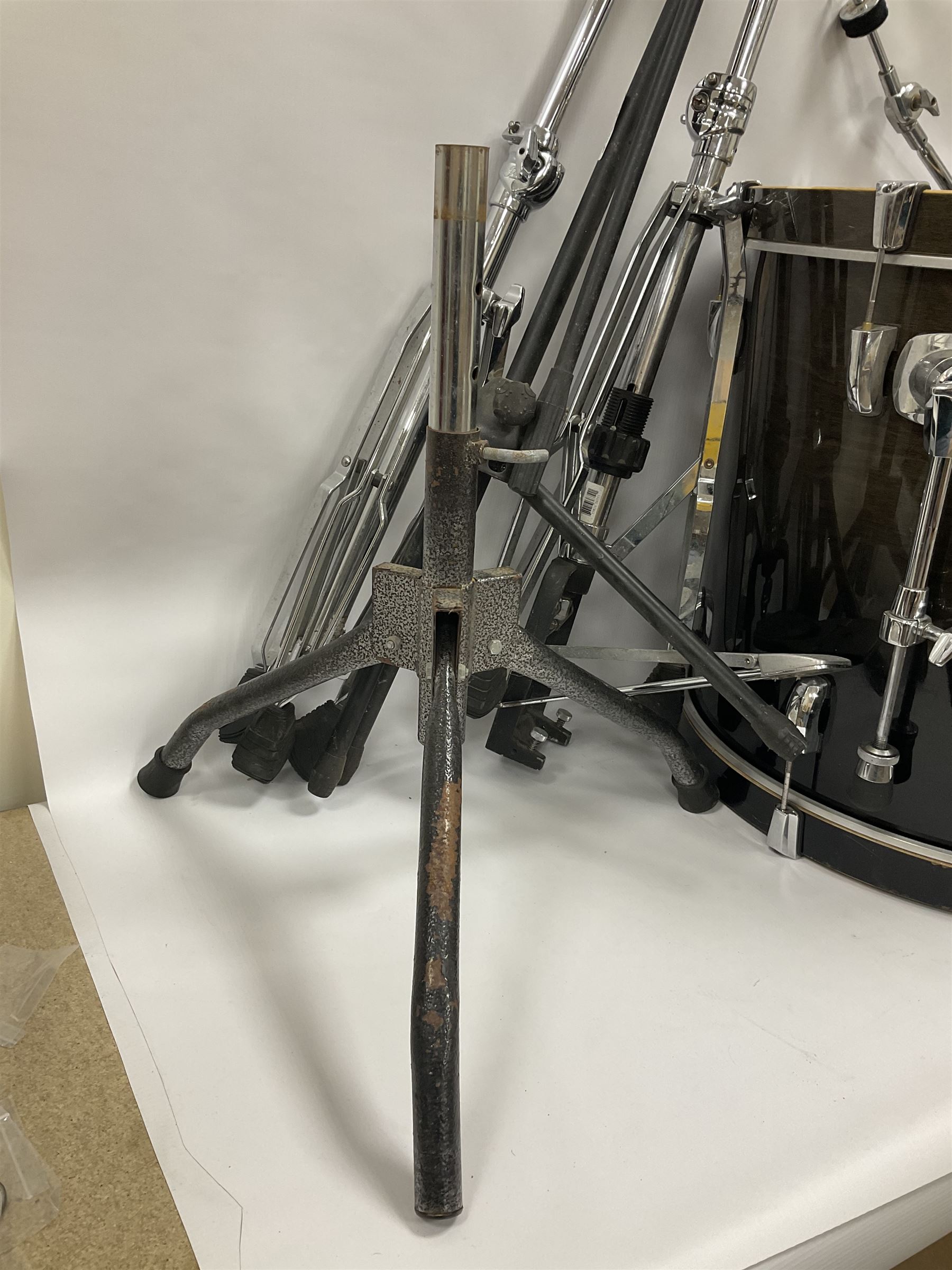 Pearl Vision SST Birch Ply shell four-piece drum kit in black comprising bass drum with foot pedal and three graduated toms; together with Pearl Custom Alloy Sensitone steel snare drum, drum and cymbal stands, microphone stand, stool and various drum sticks 