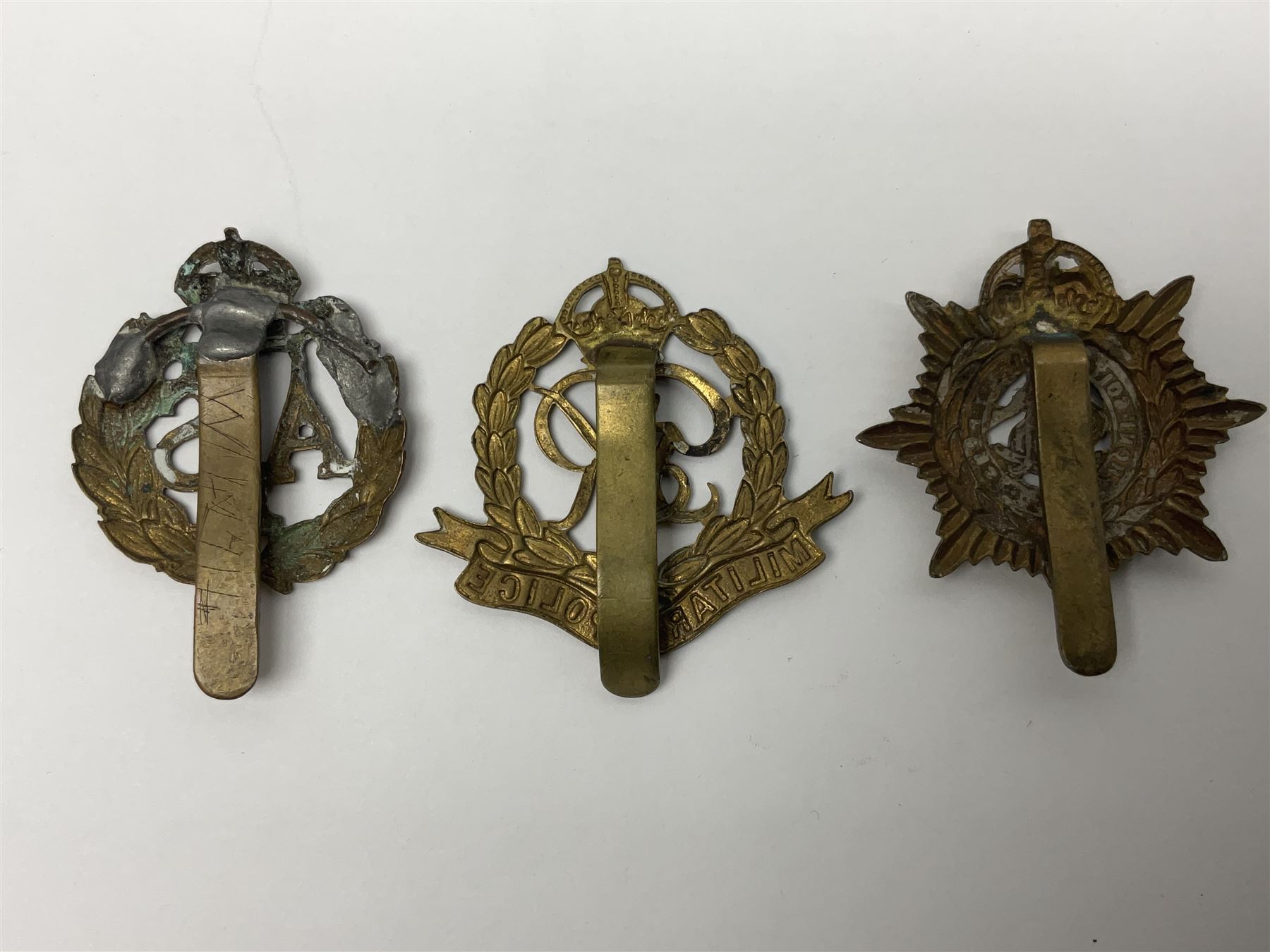 Twenty-seven military metal cap badges including Royal tank Corps, Reconnaissance Corps, Royal Armoured Corps, Royal Corps of Signals, Womens Army Auxiliary Corps, Queen Mary's Army Auxiliary Corps, Auxiliary Territorial Service,  Royal Engineers, REME, Army physical Training Corps etc 