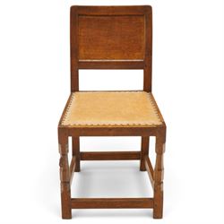 Mouseman side chair- panelled adzed back over tan leather upholstered seat with studwork, ...