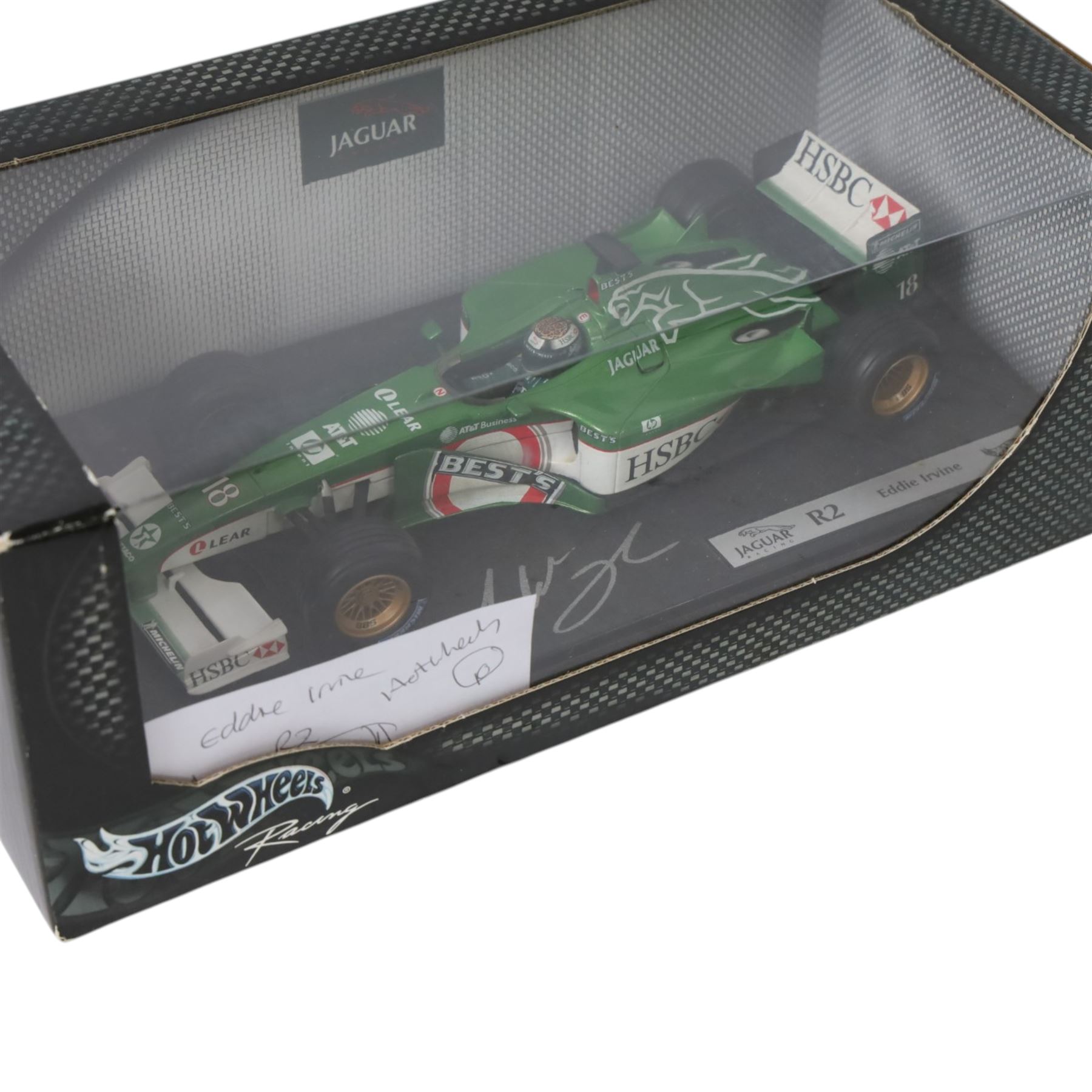 Three signed limited edition 1:18 scale Formula One models, comprising Hot Wheels Jordan EJ12 signed by Takuma Sato, Hot Wheels Jaguar Racing R2 signed by Eddie Irvine and a Minichamps Williams F1 Team model signed by Jenson Button, 1:18 scale model, all boxed