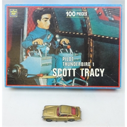  Corgi diecast James Bond's Aston Martin D.B.5 from the film Goldfinger, with both figures and a Scott Tracey thunderbirds 100 piece puzzle, complete (2)  