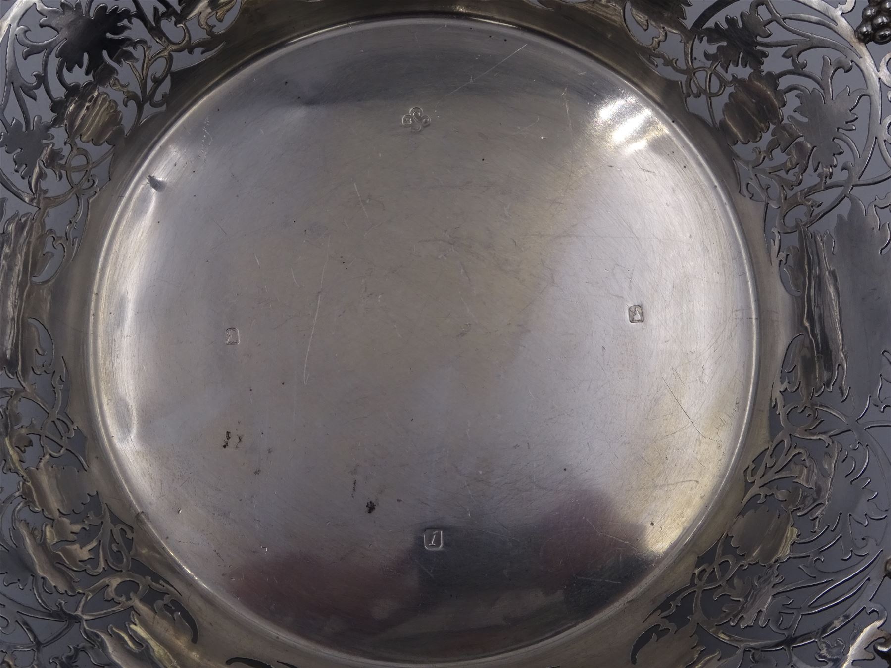 Modern silver Britannia standard fruit bowl, of lobed circular form, with applied and pierced fruiting vine decoration throughout, upon three bracket feet, hallmarked 1966, maker's mark BSC