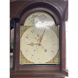 Early 19th century oak and rosewood banded longcase clock, scrolled pediment over stepped arch hood door, enamel painted dial indistinctly signed for a Penrith maker, 30-hour movement striking on bell