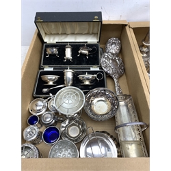  A selection of assorted silverplate, to include a pair of filled candlesticks with oblique gadrooned detail, another pair, and a pair of dwarf candlesticks, two cased cruet sets, consisting open salt, pepper, and mustard pot, other uncased cruets, a pedestal dish, various small bowls and trays, assorted cased flatware, to include silver plated sets, etc.  