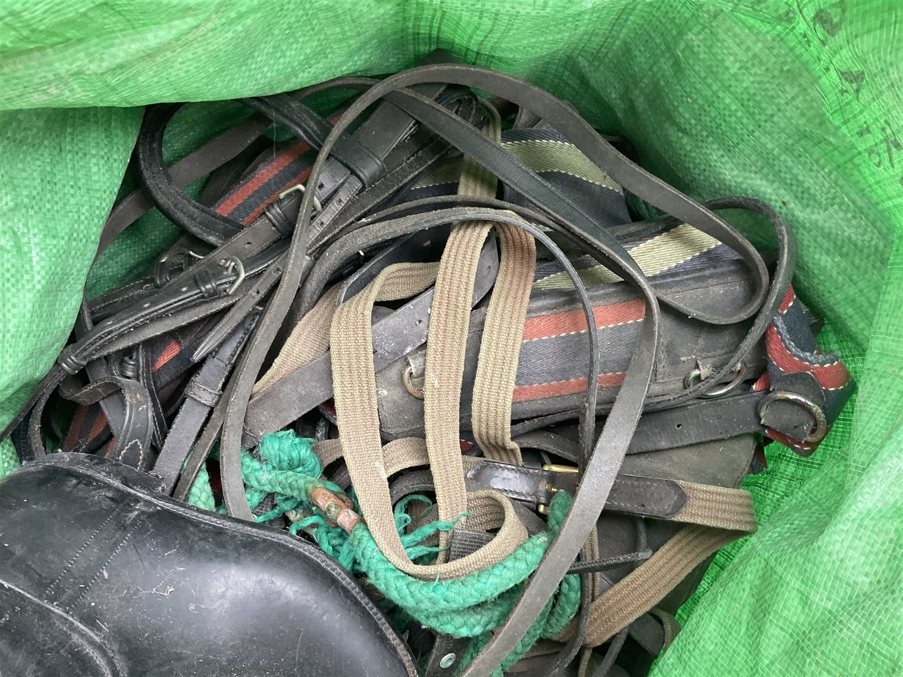 Quantity of horse tack to include bits, bridles, lunging equipment, brushing boots, tail guards, jodpa boots etc  
