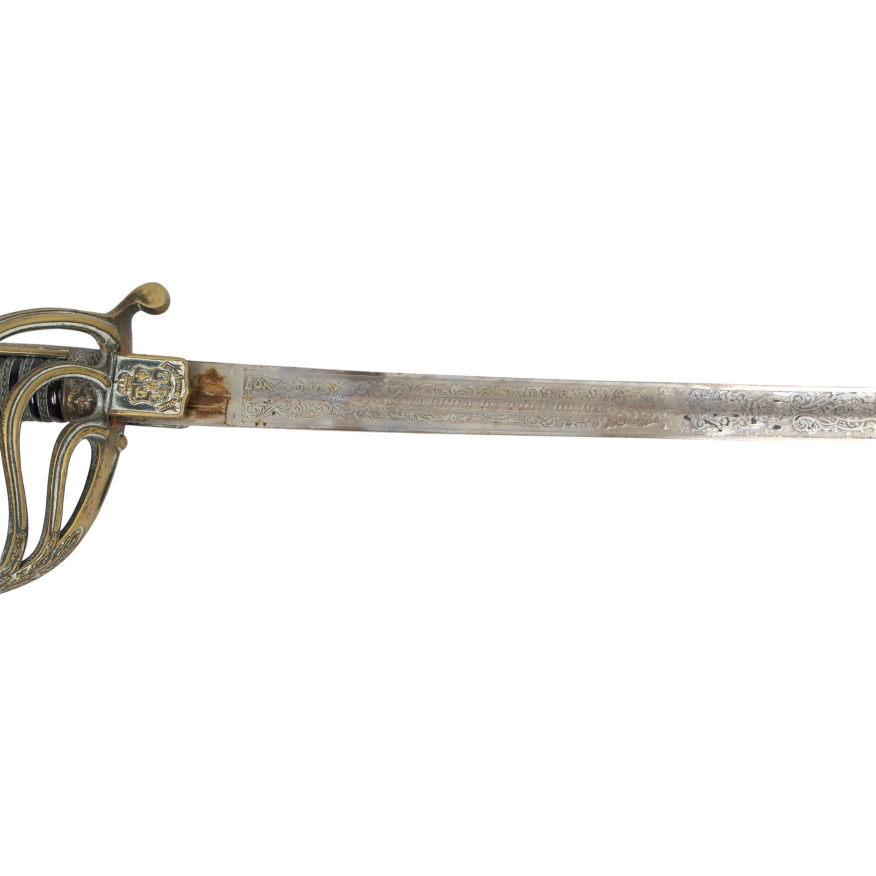 Spanish Dress Sword, 80cm single edge steel blade, etched Fabrica de Toledo, the nickel hilt with pierced guar, wire bound grip and eagle head pommel, with steel scabbard, overall L100cm