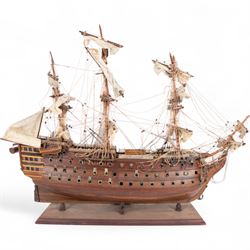 Wooden scale model of HMS Victory, upon a wooden stand with name plaque, H72cm L92cm