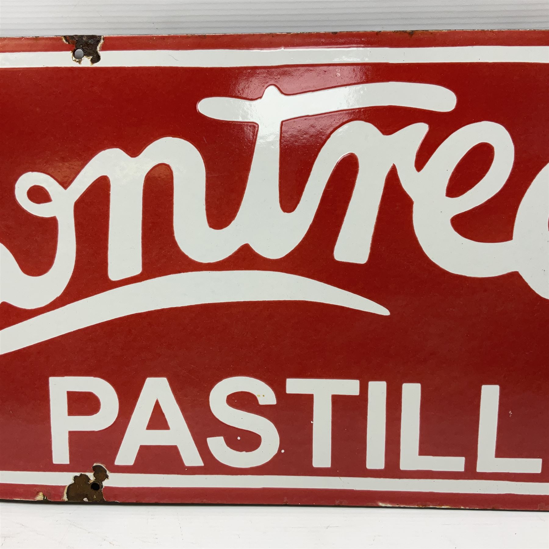 Rowntree's enamel advertising sign, 'Rowntree's Pastilles' white writing on a red ground, H30cm, L92cm