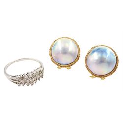 Pair of 14ct gold grey mabe pearl stud earrings and a 9ct white gold diamond cluster ring, hallmarked