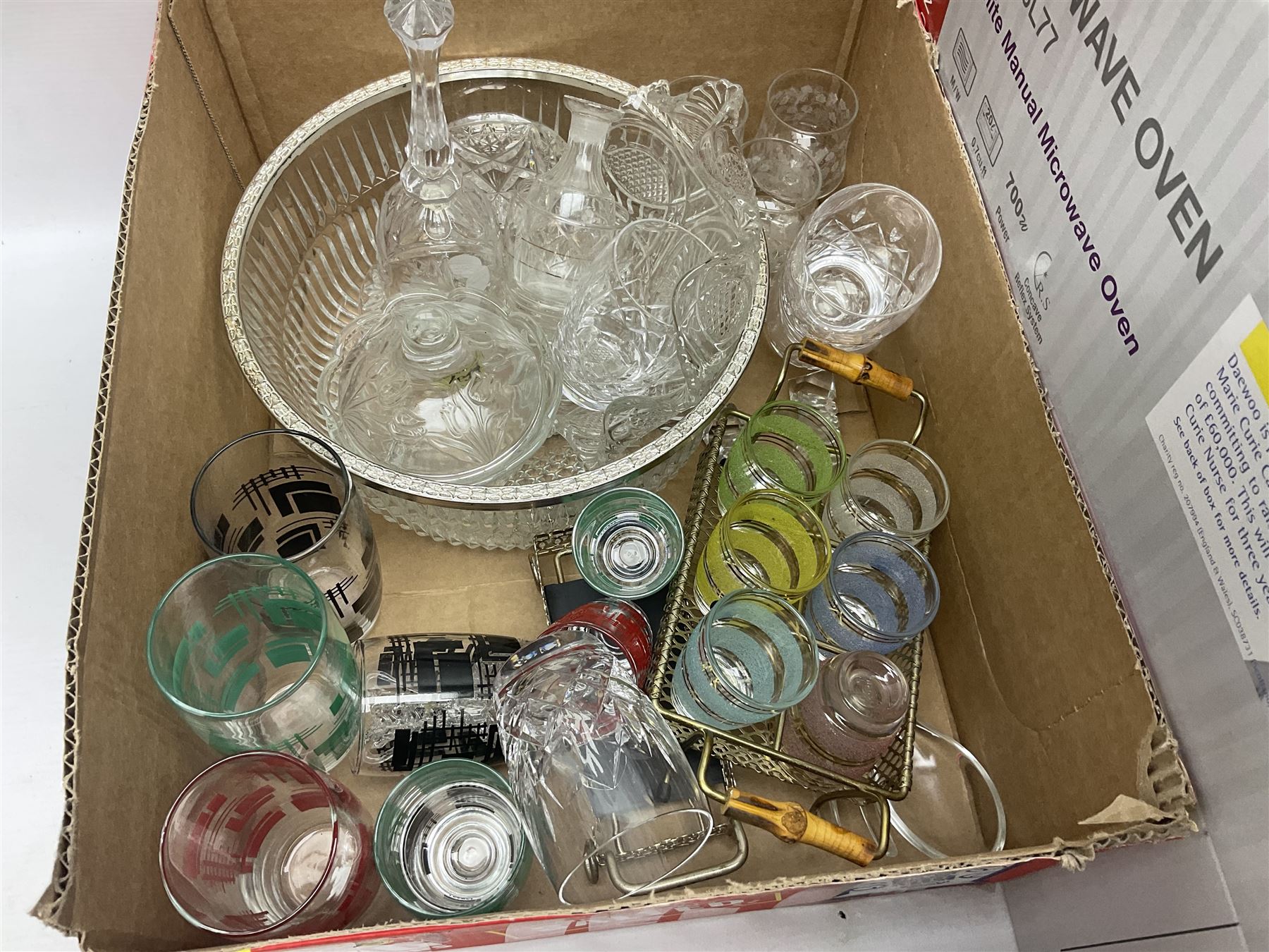 Three boxes of glassware to include mid 20th century drinking glasses with geometric and banded coloured decoration, French bowls, carnival glass, Stuart drinking glasses, etc