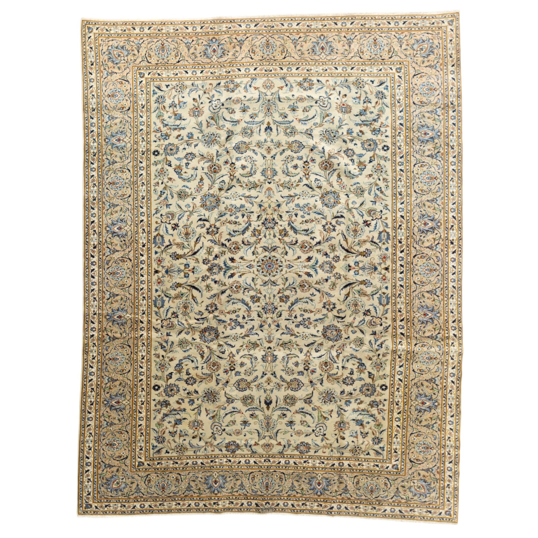 Central Persian Kashan hand-knotted rug, ivory field intricately decorated with an all-over design of scrolling vines, palmettes, and stylized lotus motifs in shades of soft blue, pale gold, and indigo within floral borders