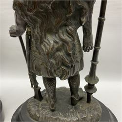 Pair of bronzed figure modelled as a hunter in traditional dress, each holding a pike, H48cm