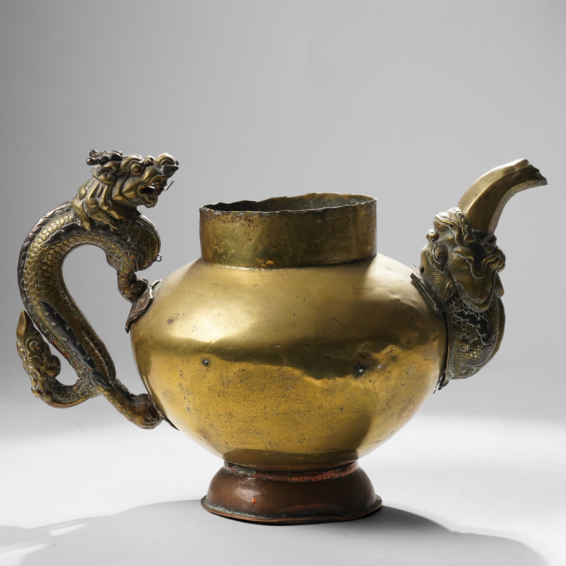 Tibetan brass teapot, the handle and spout formed as a dragon, H21cm