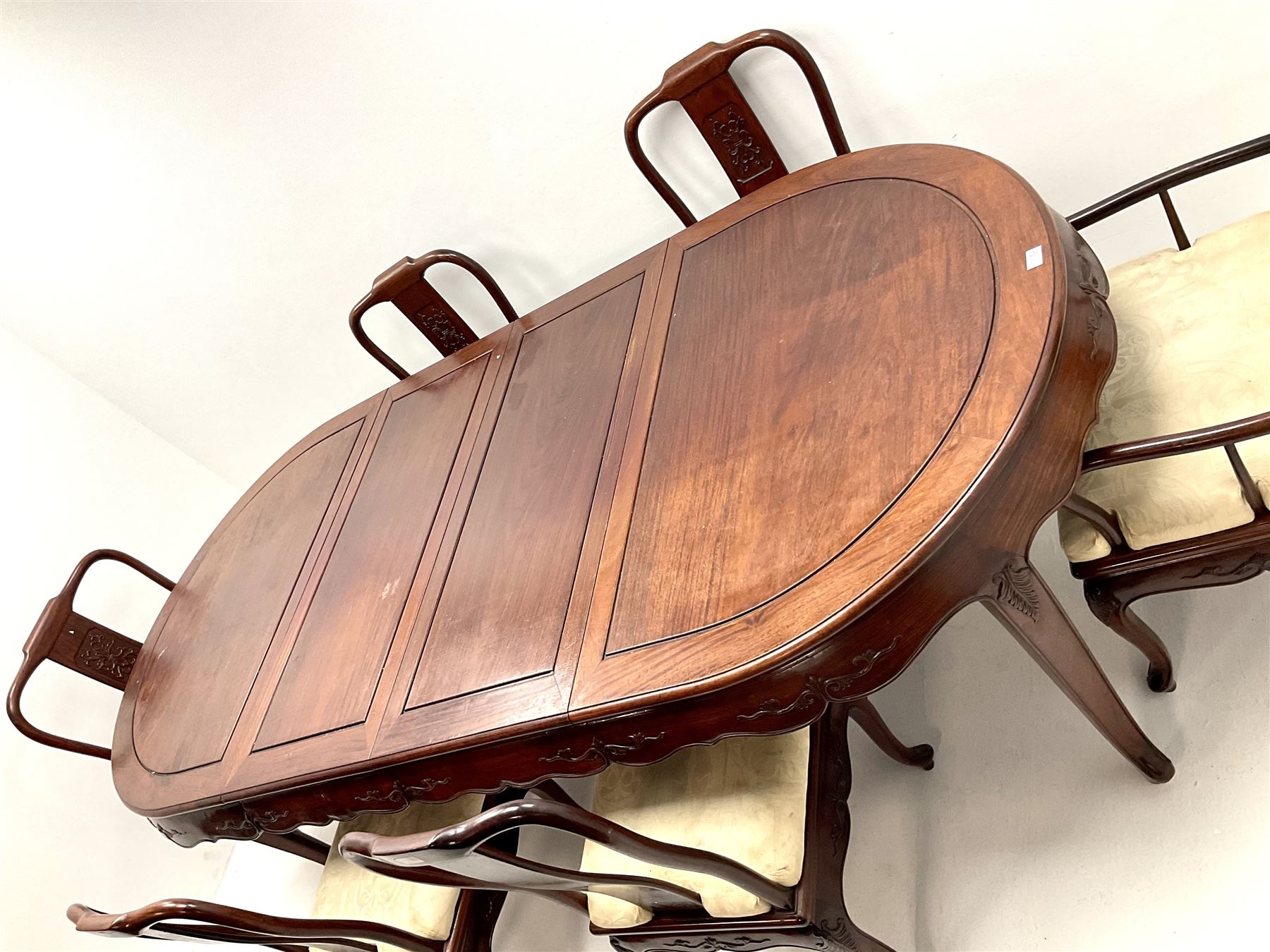Chinese rosewood extending dining table, two leafs, shaped apron, carved, reed and tapering supports (W246cm, H78cm, D117cm) and set six (4+2) dining chairs, shaped cresting rail, carved splat, upholstered seat, tapering supports (W57cm)