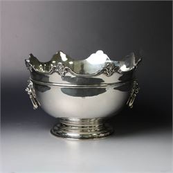 Edwardian silver Monteith punch bowl, the scalloped rim with strapwork and figural decorat...