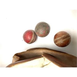 A Vintage leather cricket bag and equipment, to include cricket bats, balls, wickets, and pads. 