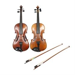 Two 19th century violins, each with two piece maple backs, ebonised wooden pegs and finger boards and modern plastic chin rests, with two bows, all contained within a modern two-violin soft case with red interior