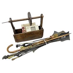 Quantity of walking sticks, fire companion tools, picture frames and spinning wheel box, box H41cm