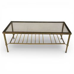 20th century brass and glass topped coffee table, the rectangular glass top within brass frame, upon four reeded legs united by lower slatted under tier 