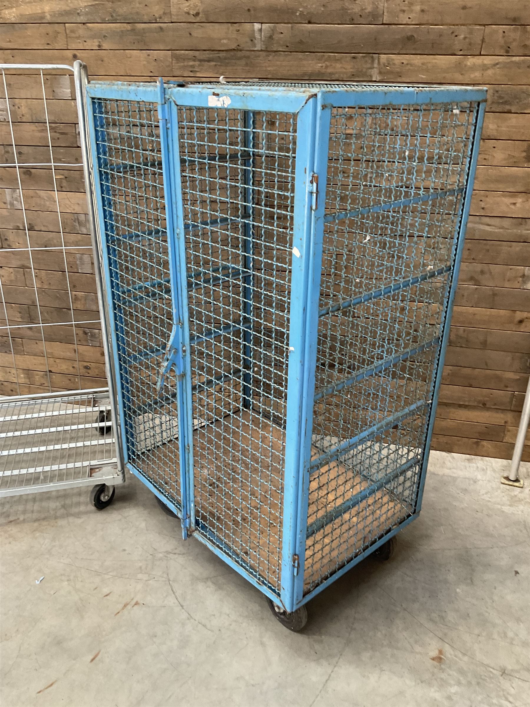 Three sided laundry roll container trolley (W119cm, D81cm, H184cm) and another trolley (W118cm, D78cm, H180cm)