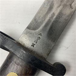 British Pattern 1888 knife bayonet, the 30cm double edged blade by Sanderson with central raised medial ridge and various marks to the ricasso including date code 12 98; in leather covered scabbard with various stamped marks L44cm overall