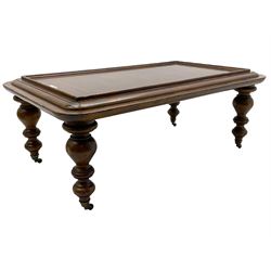 Milling Road - cherry wood coffee table, rectangular top with rounded corners, on turned feet with castors