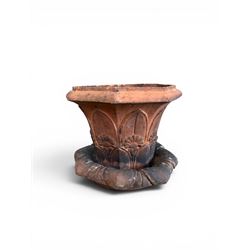 Small 19th century terracotta octagonal planter with stand, flower and leaf design