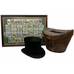 Top hat by Tress and co, in a fitted leather case, together with a framed set of 50 players cycling cigarette cards. 